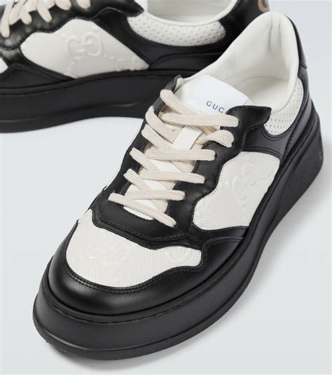 gg embossed leather sneakers